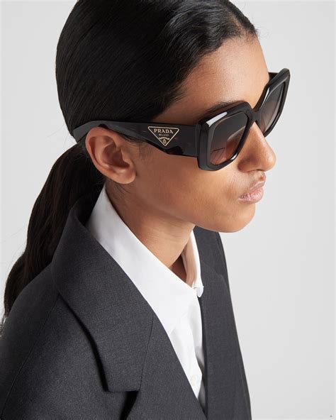 Sunglasses With Prada Logo.